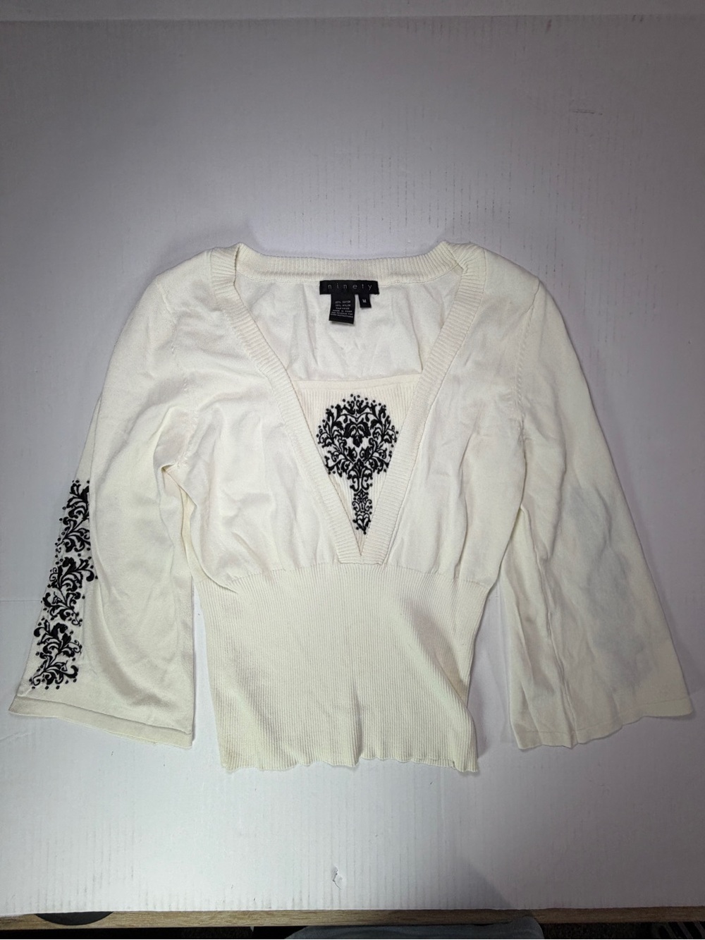 Y2K Ninety Cream V-Neck Knit Top with Black Damask Detail